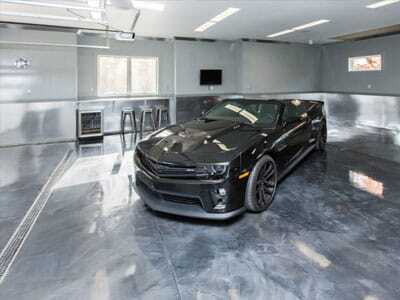 car on epoxy flooring